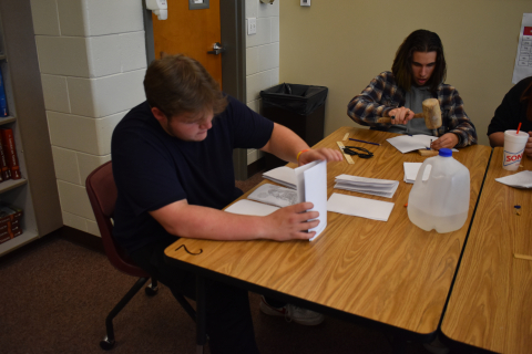 Students craft journals in Leadership Class