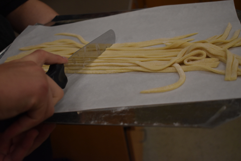cutting the noodles