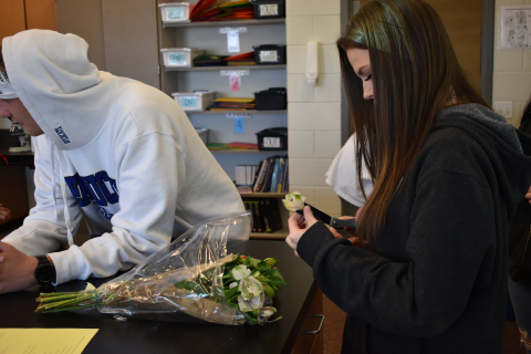 Students get their flower samples ready