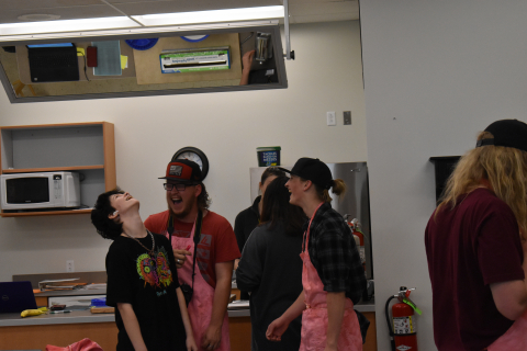 Students celebrate their pizza success