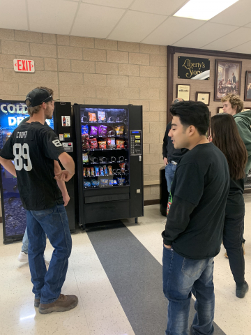 Students vs the chips in the vending machine