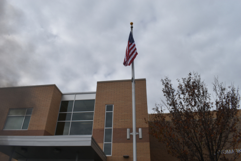 The flag flies over Landmark High School