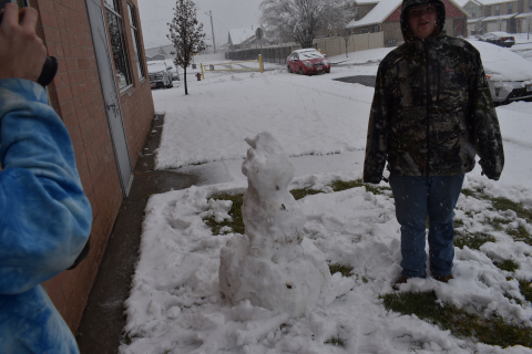 Brody builds a snowman