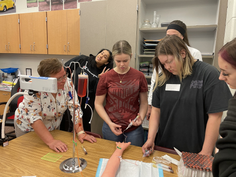 MTech teaching students about the career of phlebotomy