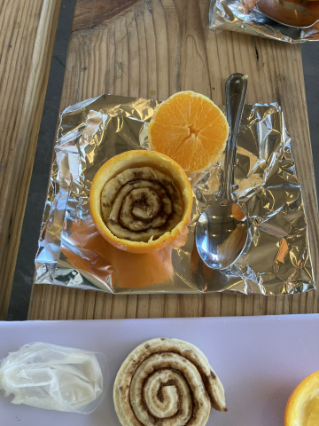 Cinnomon rolls baked in an orange peel 